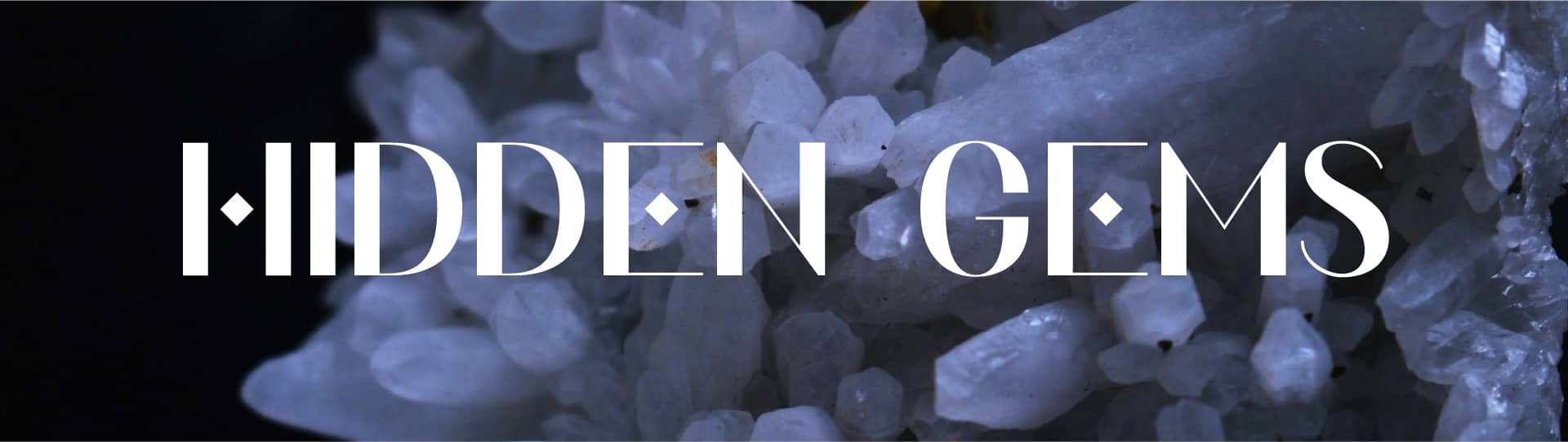 Hidden Gems text over crystal background